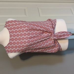 Loft Sleeveless Patterned Blouse with button down back and tie up front.